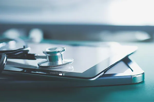 Advanced-Diagnostic-Testing-Clinic Close up of a stethoscope lying on a tablet, representing advanced functional medicine testing offered by Anita Petruzzelli, M.D. in Glastonbury.