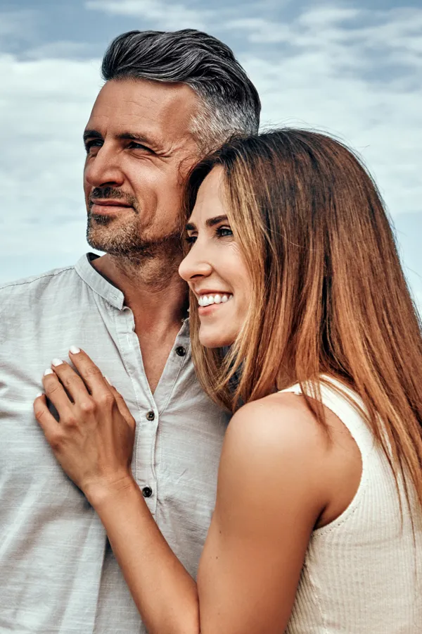 Epigenetic-Longevity-Medicine-Treatment A middle-aged couple look out to the ocean. Get epigenetic testing from Anita Petruzzelli, M.D. in Glastonbury.