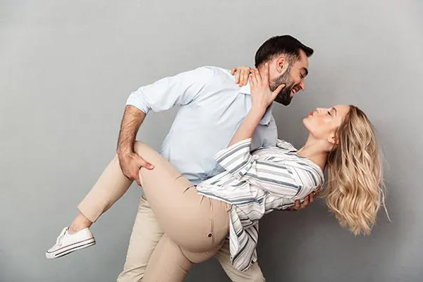 Erectile-Dysfunction-Medications-Clinic A couple dancing and performing a dip. Schedule medications for erectile dysfunction from Anita Petruzzelli, M.D. in Glastonbury.